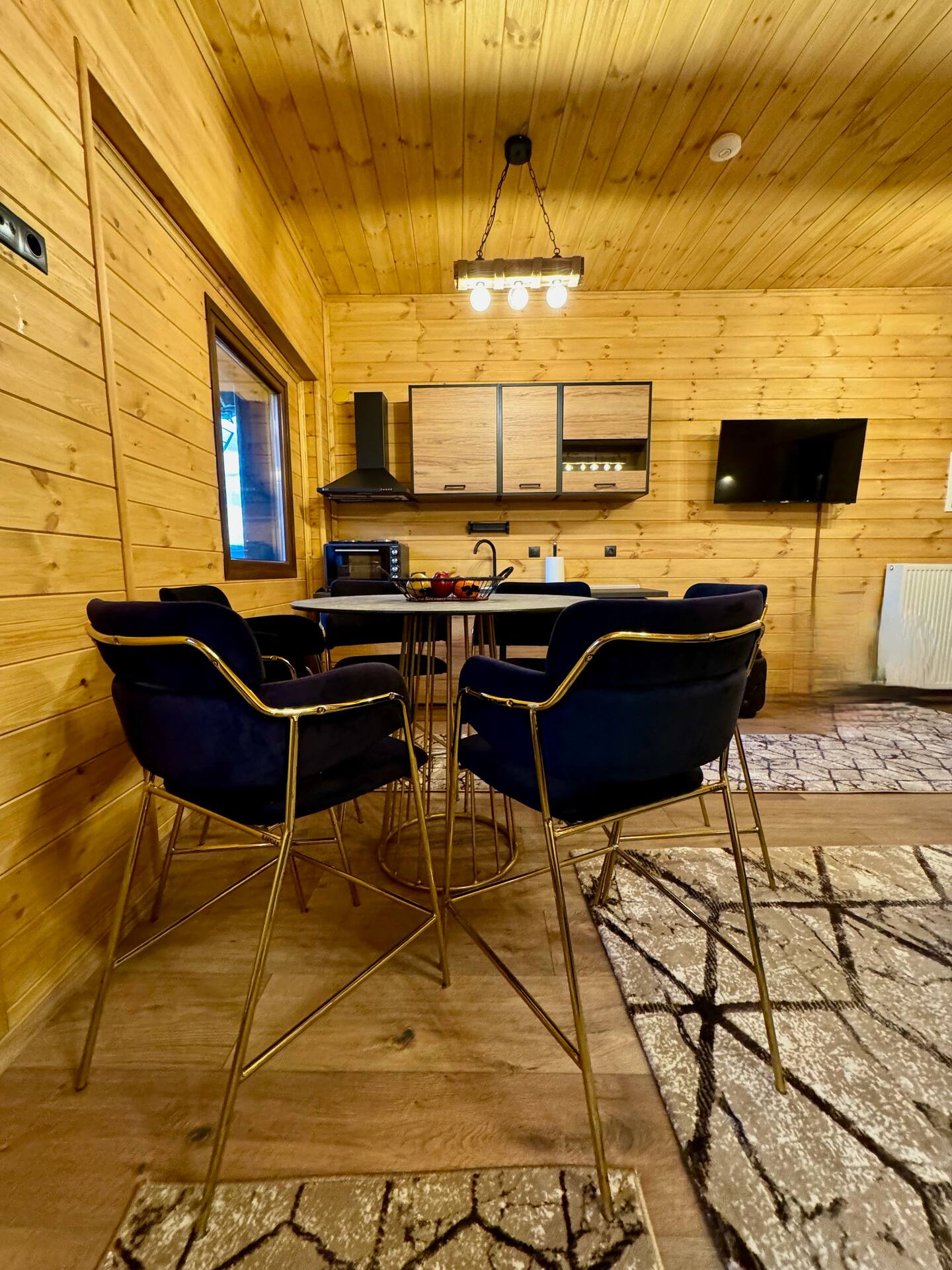 Gold velvet chairs dining area